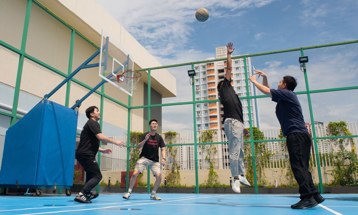 Micron workers playing basketball
